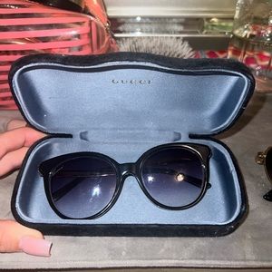 Black Gucci with gold detail sunglasses